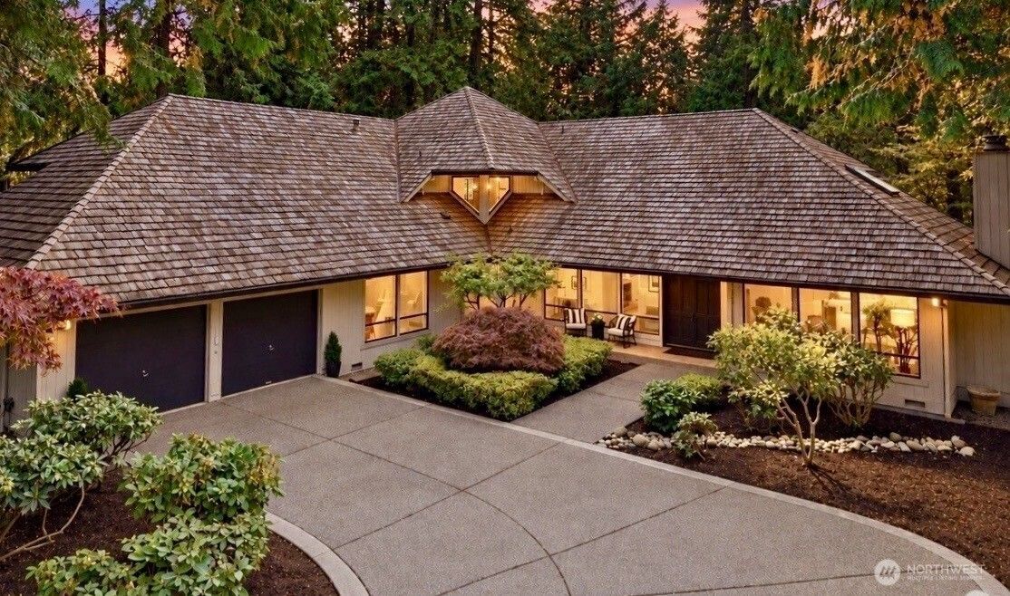 Aerial view of 21845 NE 30th Place, Sammamish, with its cedar roof and courtyard drive